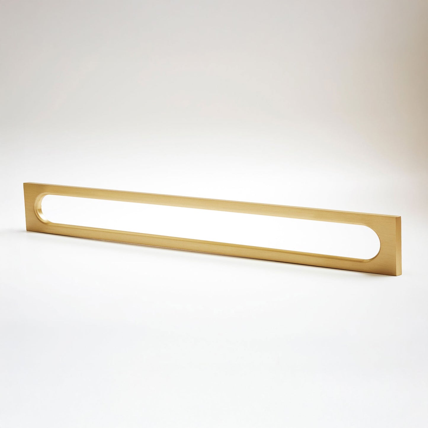 A long, narrow rectangular cabinet pull with a slim metallic frame and an elongated oval panel, shown on a clean white studio background.