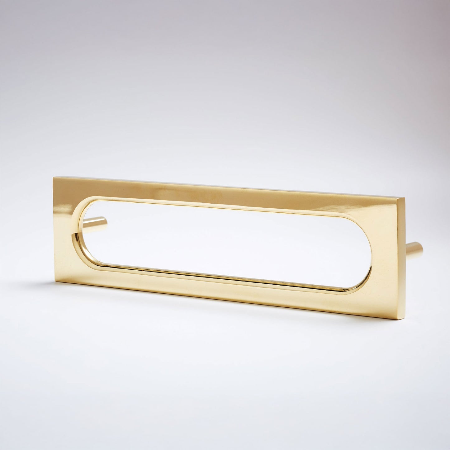 A modern rectangular door pull handle with a polished gold finish, featuring a minimalist open frame design and a small keyhole cutout on the left side, set against a clean light gray background.