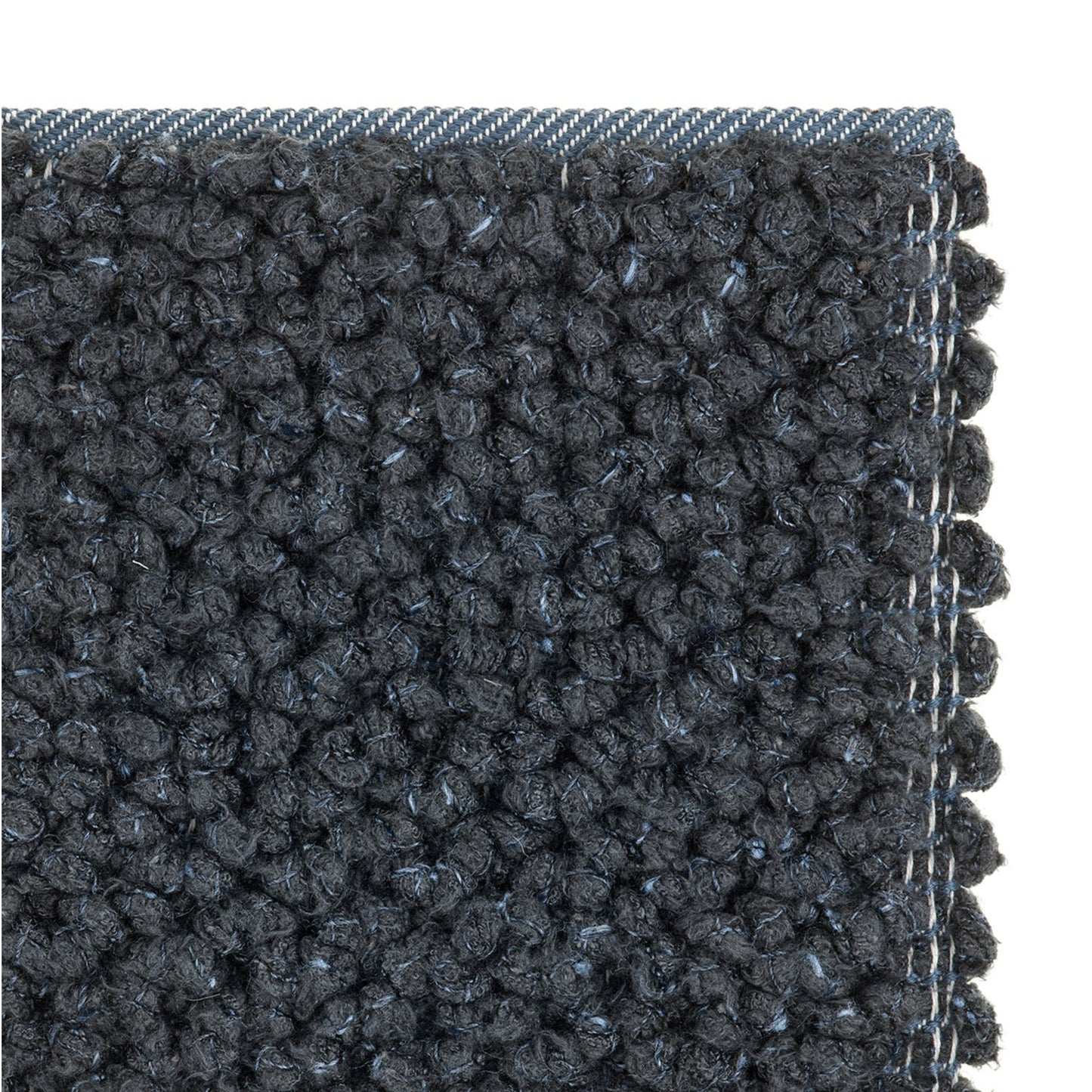 Nui rug style in Charcoal grey colored textured twill boucle weave