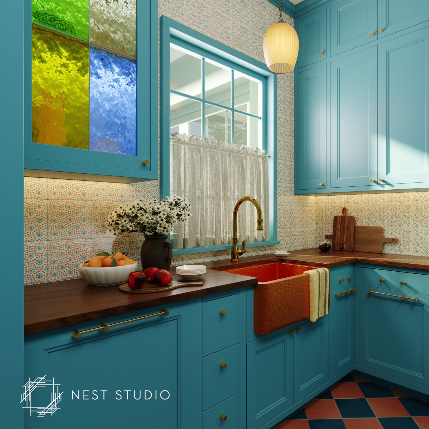 A bright kitchen corner with turquoise blue cabinets, patterned tile backsplash, dark wood countertops, a copper sink, and a hanging pendant light. A vase of white flowers and fruit sit on the counter, and the Nest Studio logo appears in the lower left corner.