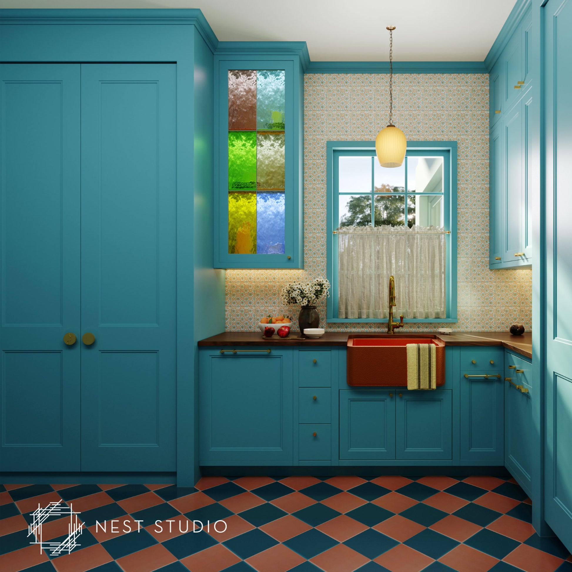 A kitchen interior with bright turquoise-blue cabinetry, a patterned cream tile backsplash, a window with a sheer curtain, a hanging pendant light, and a checkered floor in dark blue and terracotta. A Nest Studio watermark appears in the lower left corner.