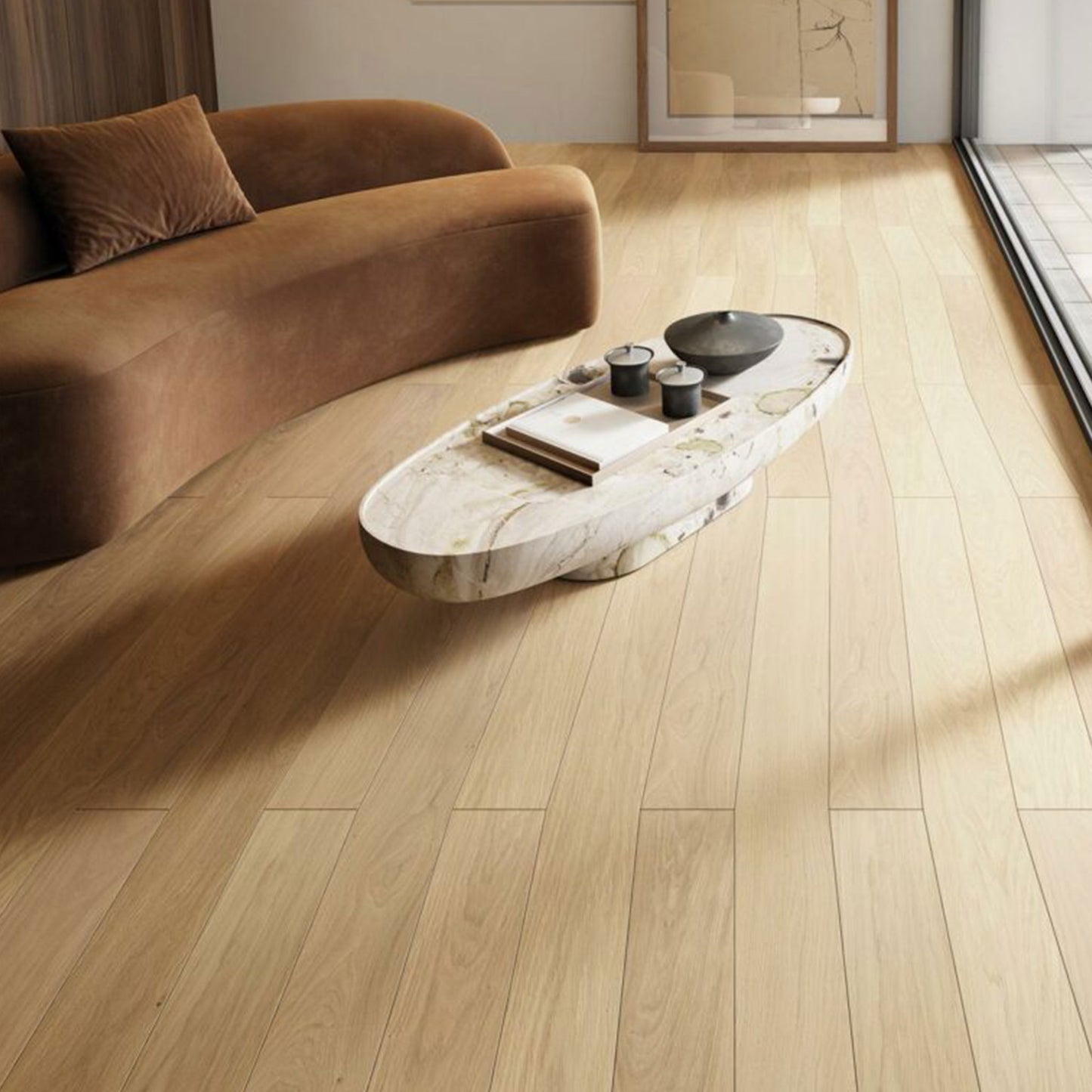 Modern living room with wooden flooring, a brown sofa, and a marble coffee table.