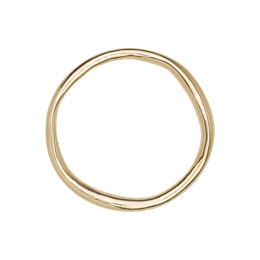 Oversized organic circle shaped cabinet pull on a white background