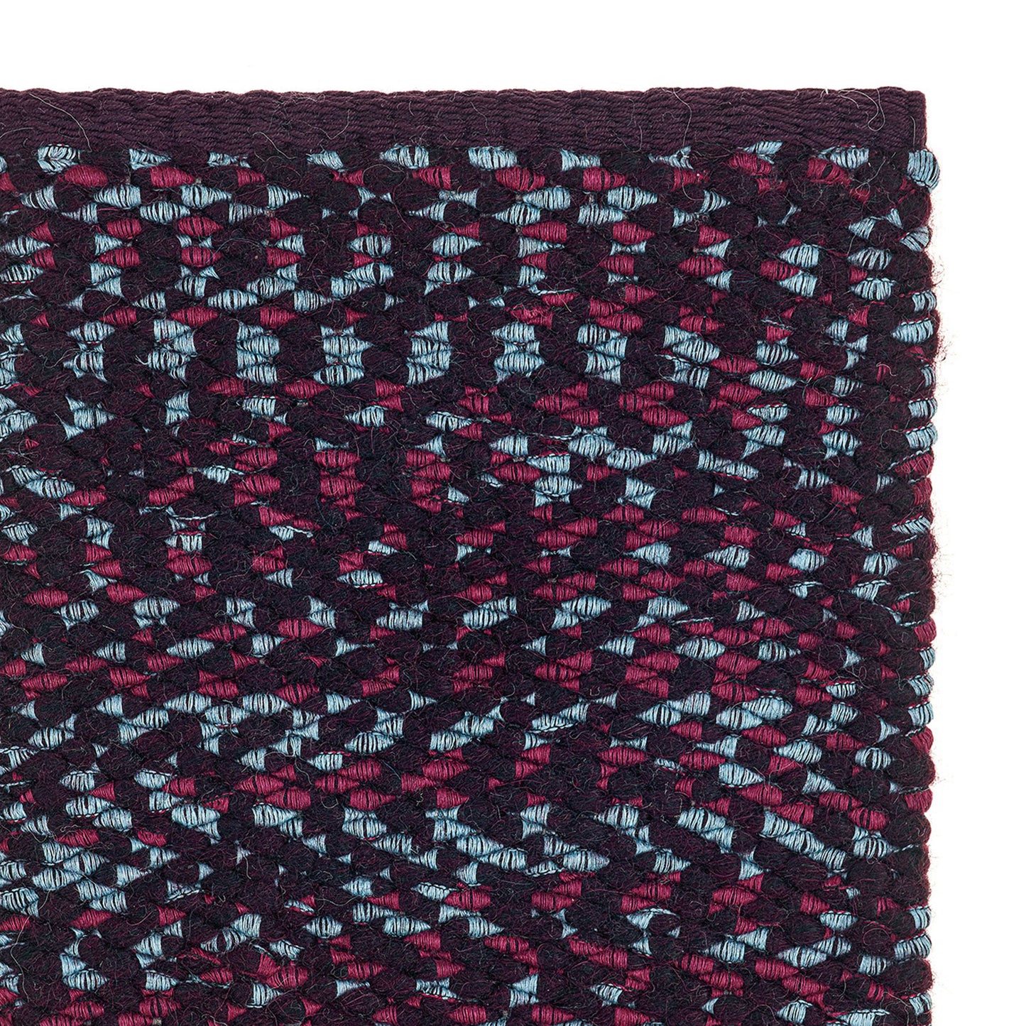 Prato rug style in pale blue, garnet and black colored twisted textured flat weave