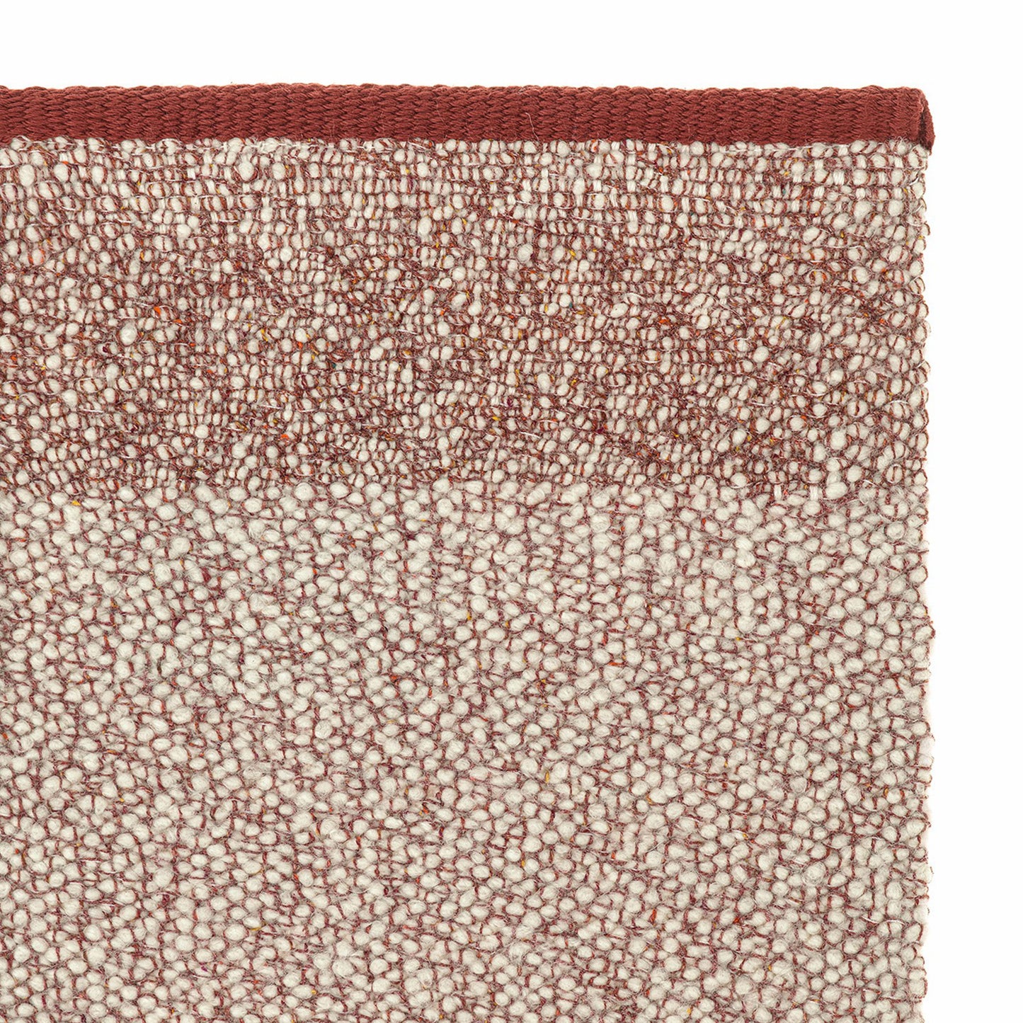 Pura rug style in cream and pale terra cotta colored twisted flat weave