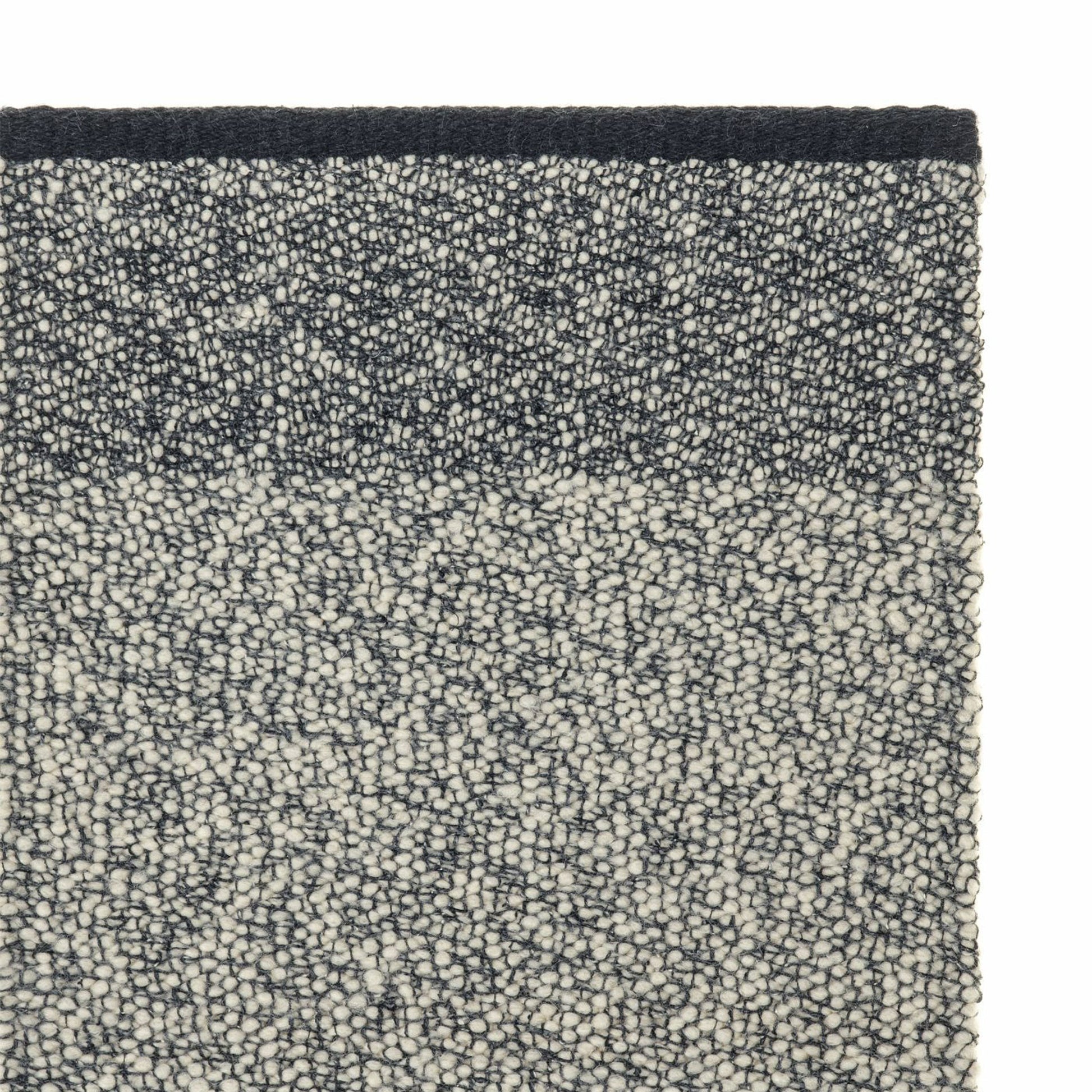 Pura rug style in black and buff colored twisted flat weave