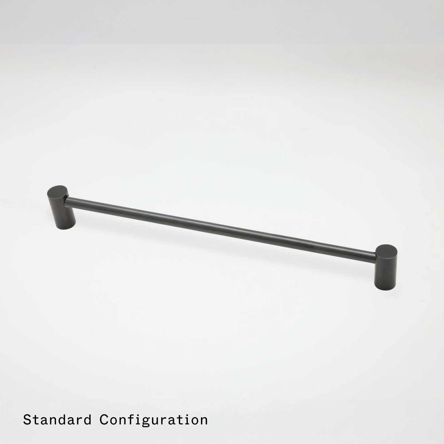 A matte black metal cabinet pull handle with a straight bar and cylindrical end caps, shown on a light gray background with the text 'Standard Configuration' in the bottom-left corner.
