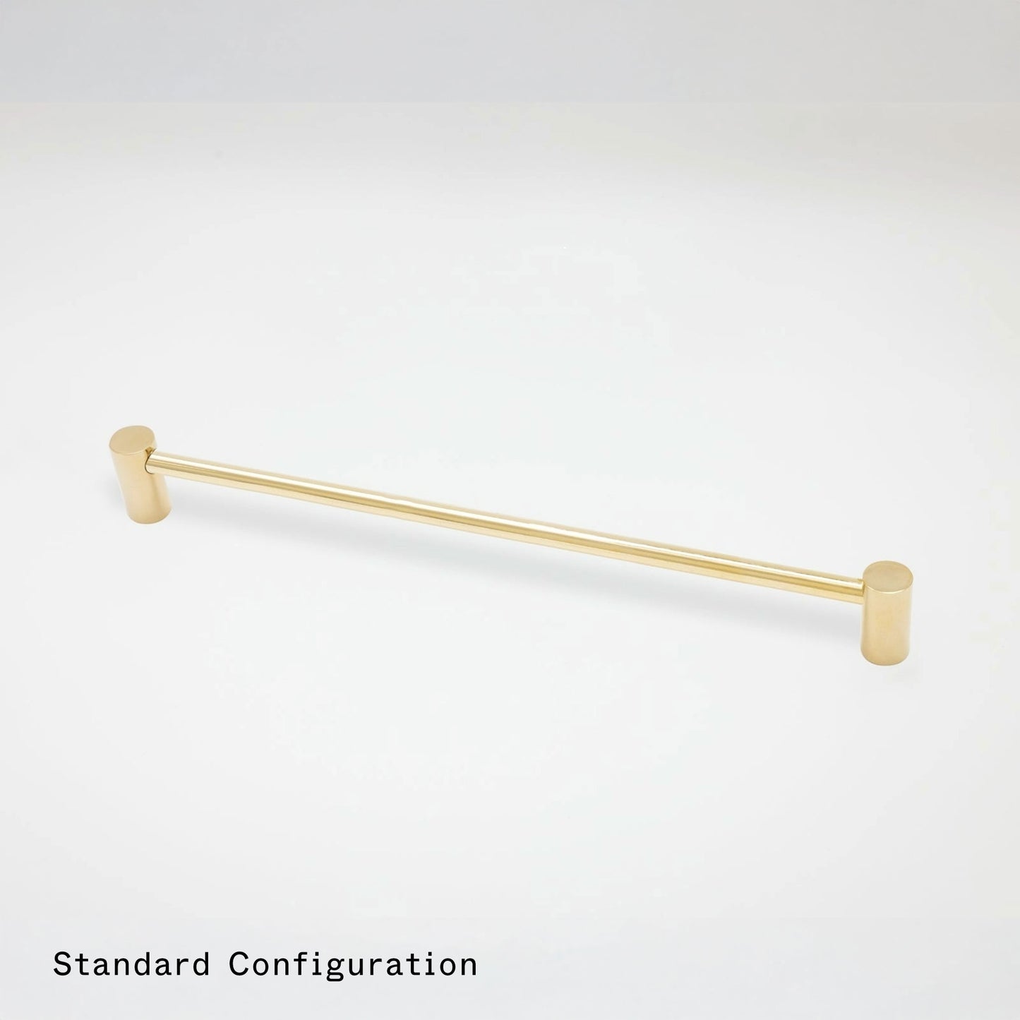 A single gold cabinet pull with cylindrical end caps, shown horizontally on a clean white background with the text 'Standard Configuration' in the bottom-left corner.