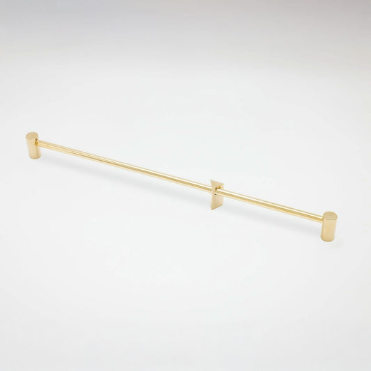 A slim gold metal cabinet pull with cylindrical end caps and two triangular wall mounts, shown on a clean white background.