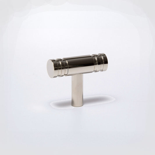 A polished brass T-shaped cabinet knob with a cylindrical handle and a straight post, shown on a clean white background.
