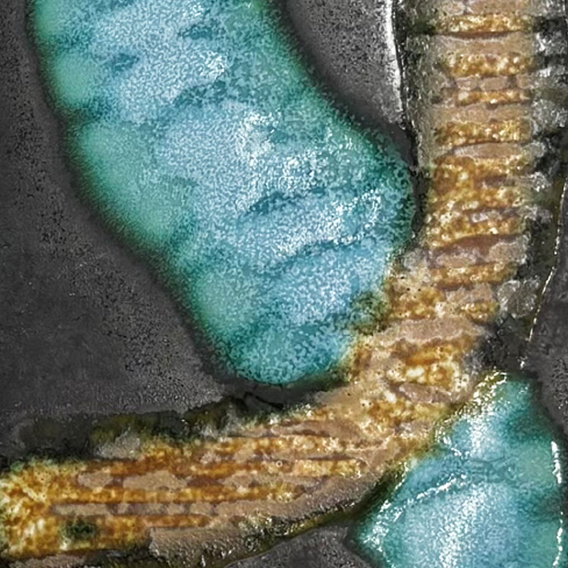 Close-up of a textured abstract surface with flowing turquoise and teal areas, metallic gold ribbed bands, and dark charcoal sections.