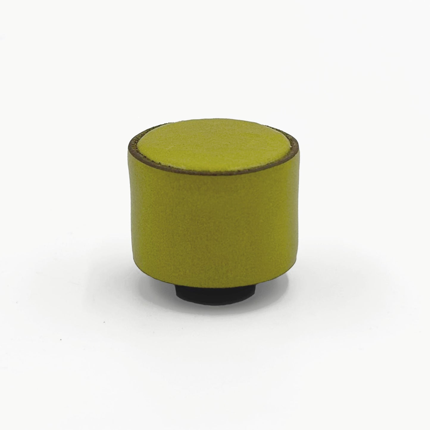 A small cylindrical leather cabinet knob top view, featuring a textured olive green body with a dark brown rim and a black base, set against a plain white background.