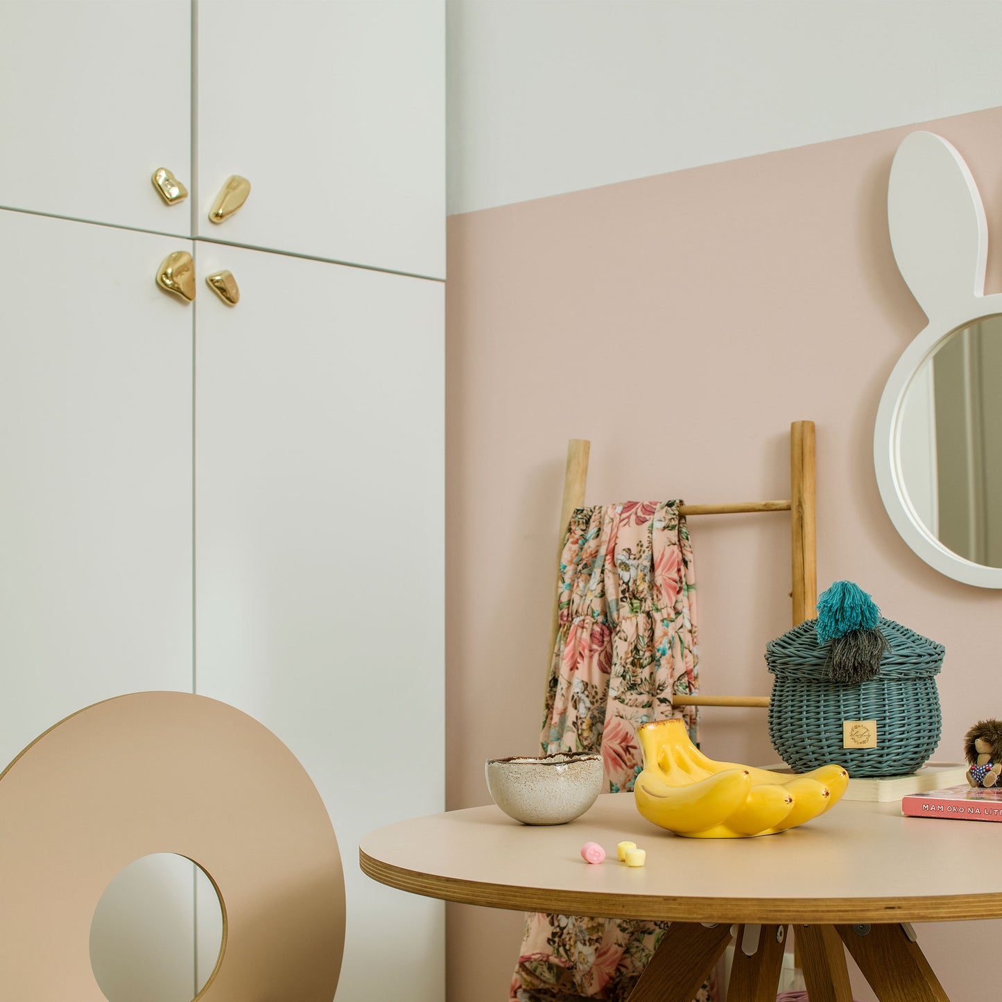 grouping of four knobs on cabinetry