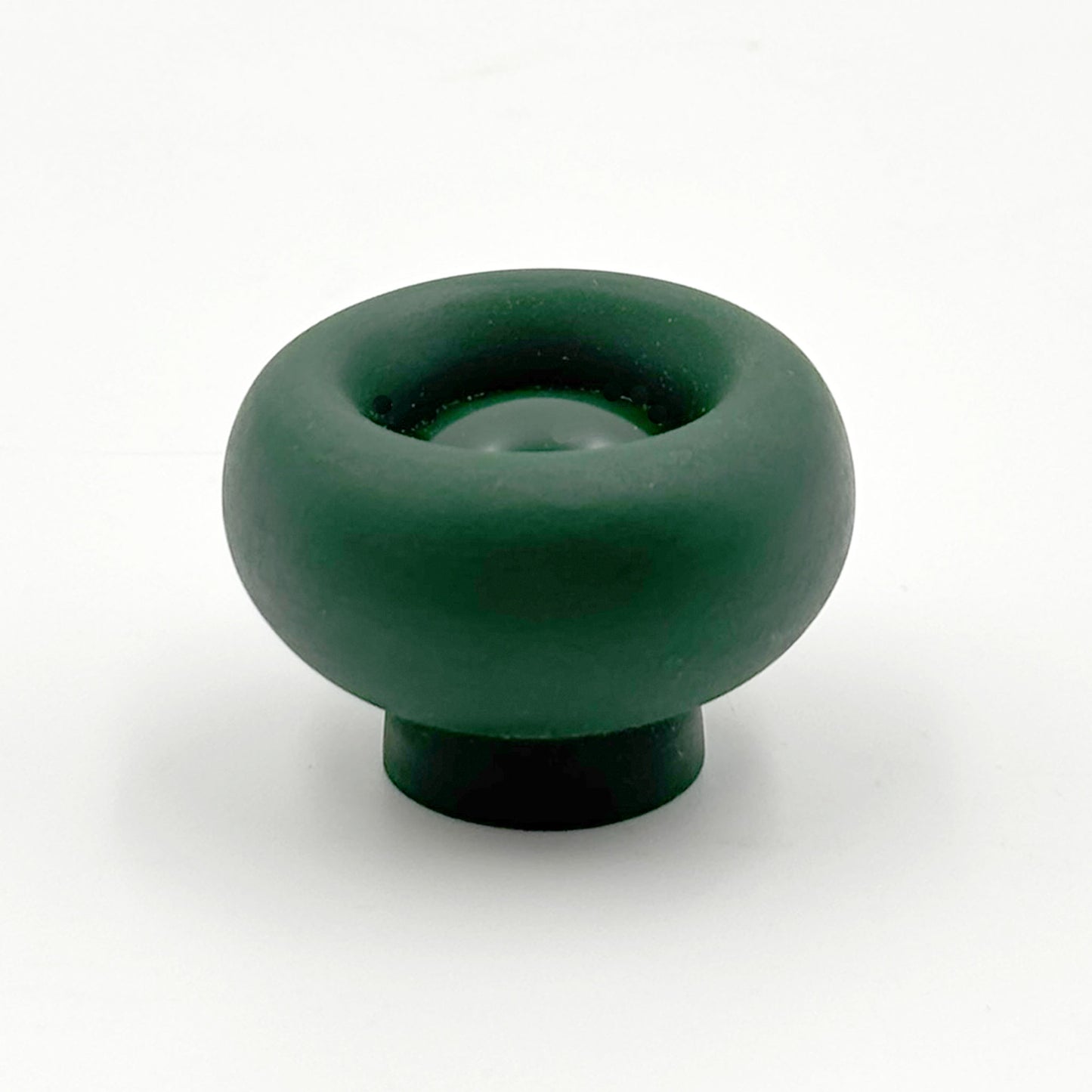 Chunky dark green colored cabinet knobs on a white background