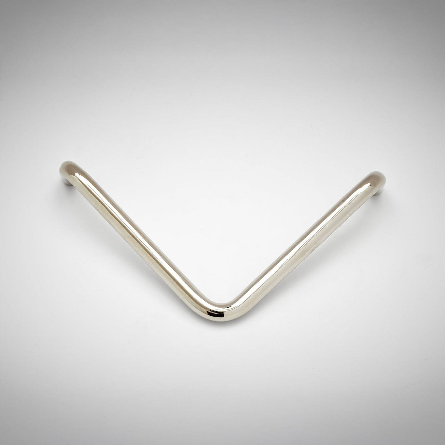 A tube metal L-shaped cabinet pull on a white background
