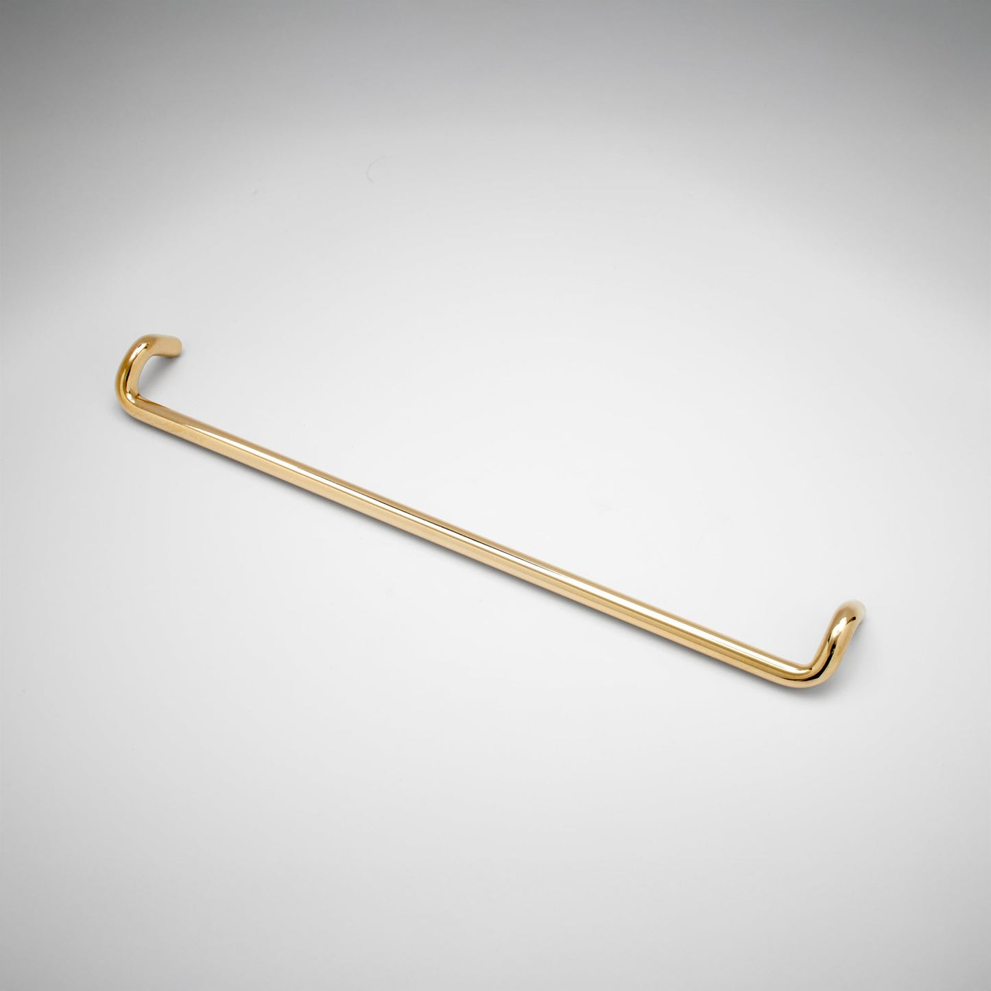 A metal cabinet pull with a curved hook design on both ends, shown on a light gray gradient background.