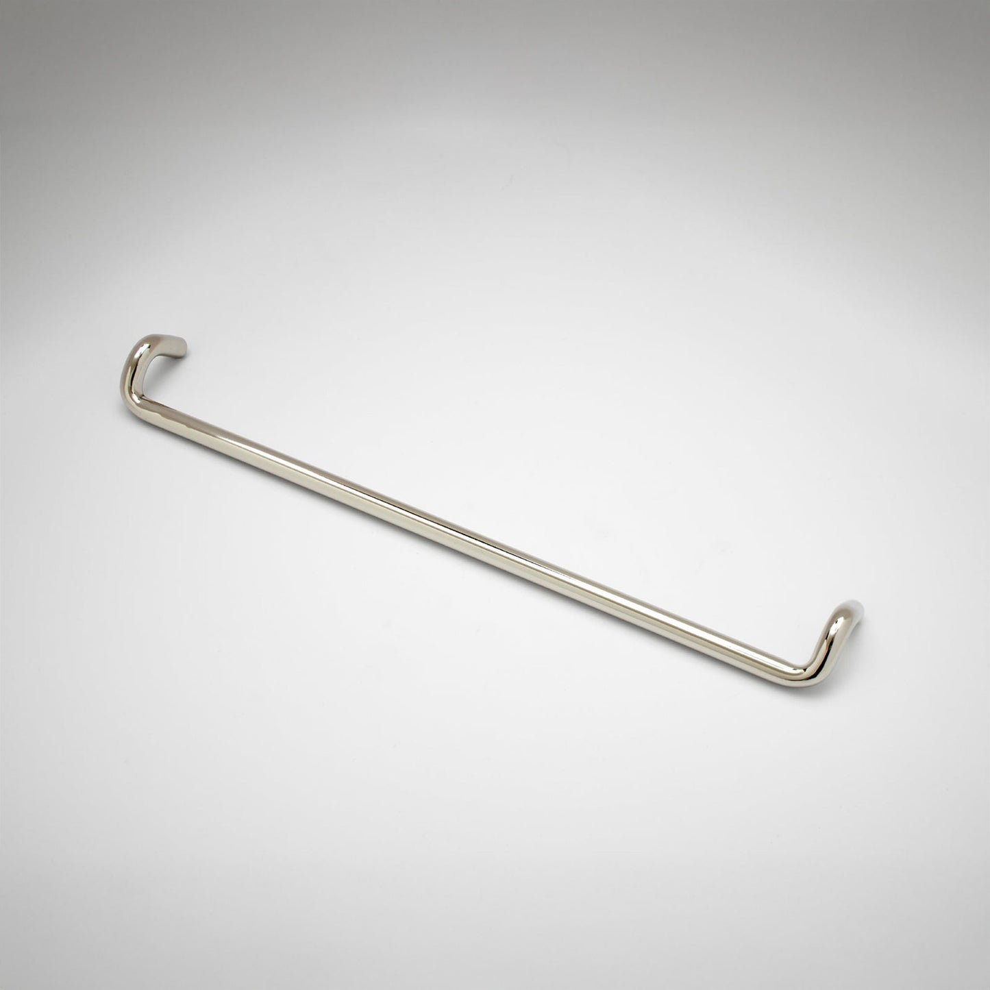 A metal cabinet pull with a curved hook design on both ends, shown on a light gray gradient background.