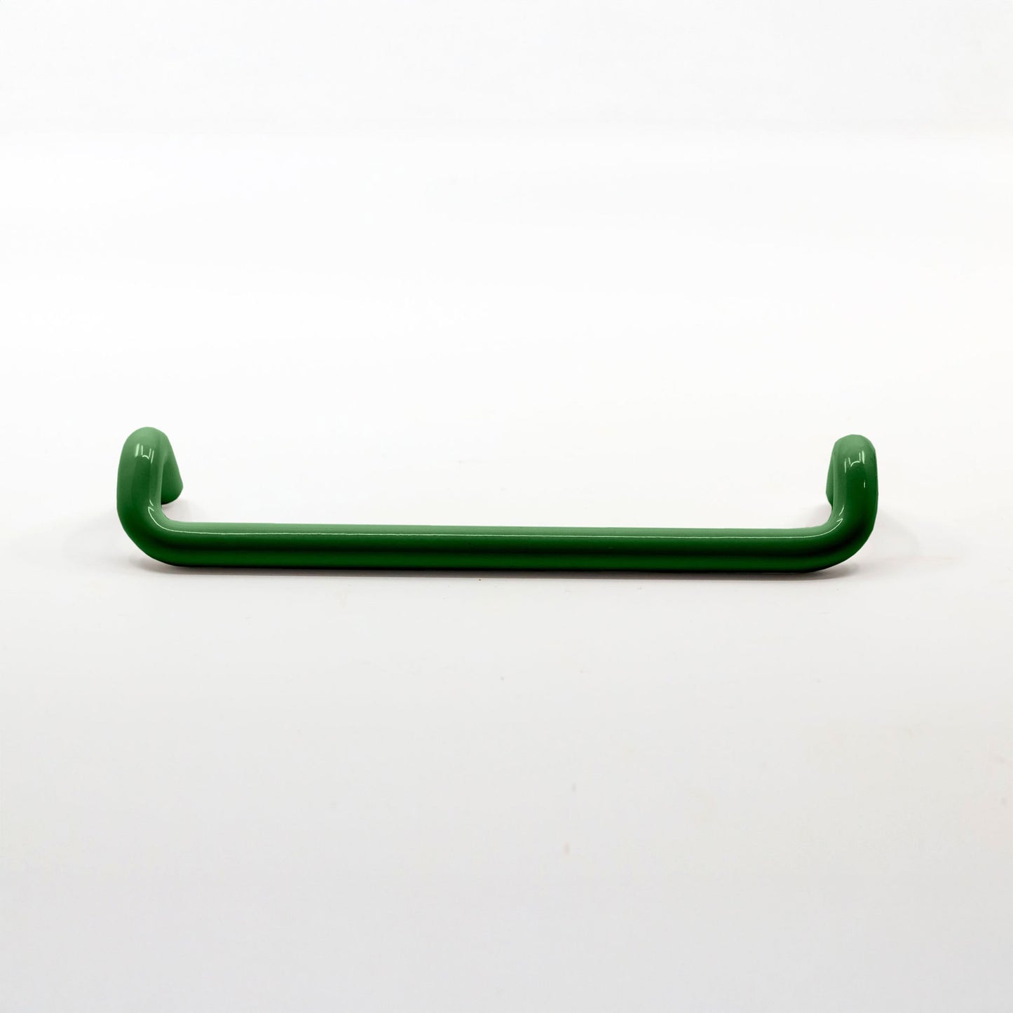 A single dark green metal cabinet pull with a curved, rounded design, shown horizontally against a plain white background.