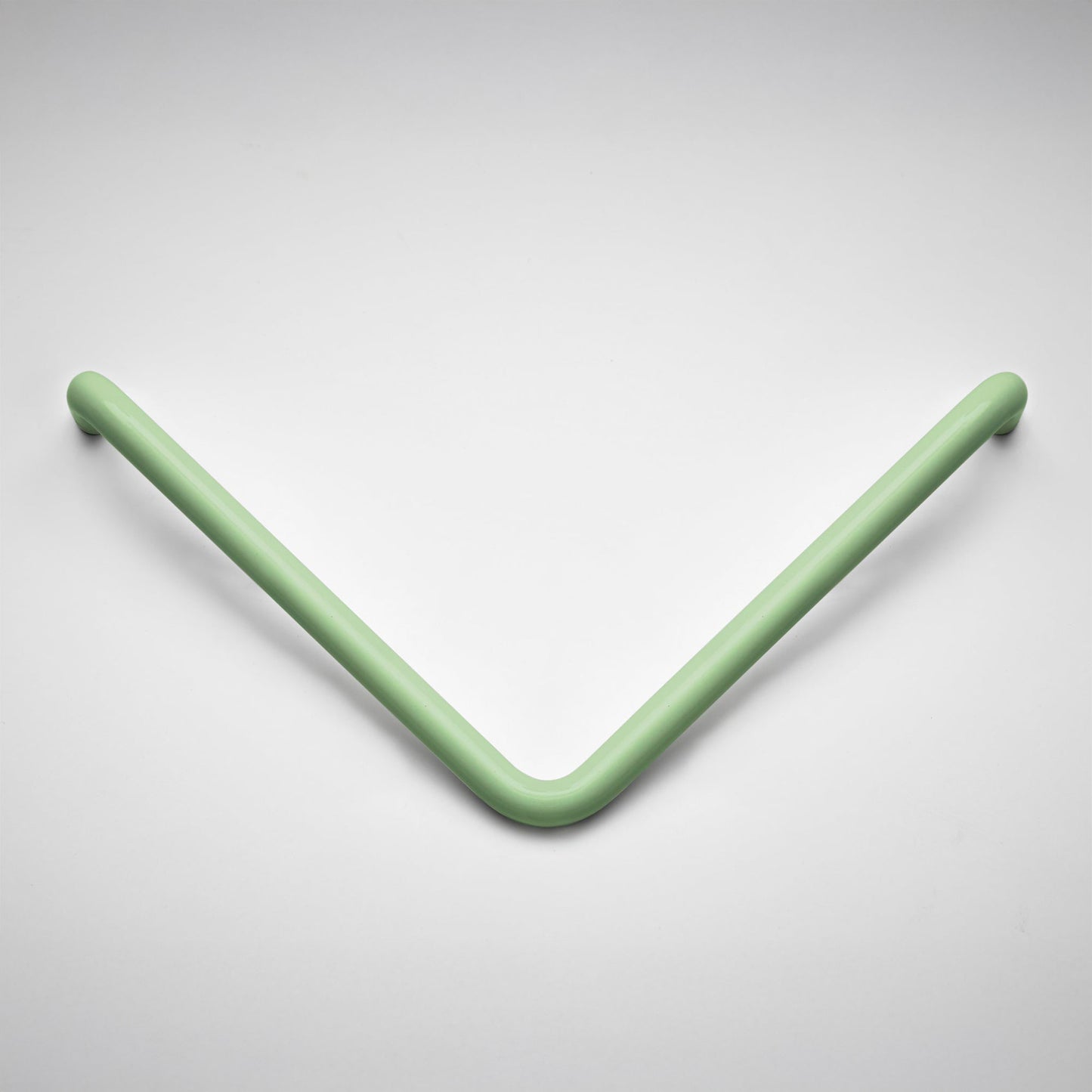 A modern V-shaped cabinet pull with rounded ends, shown against a neutral light gray background.