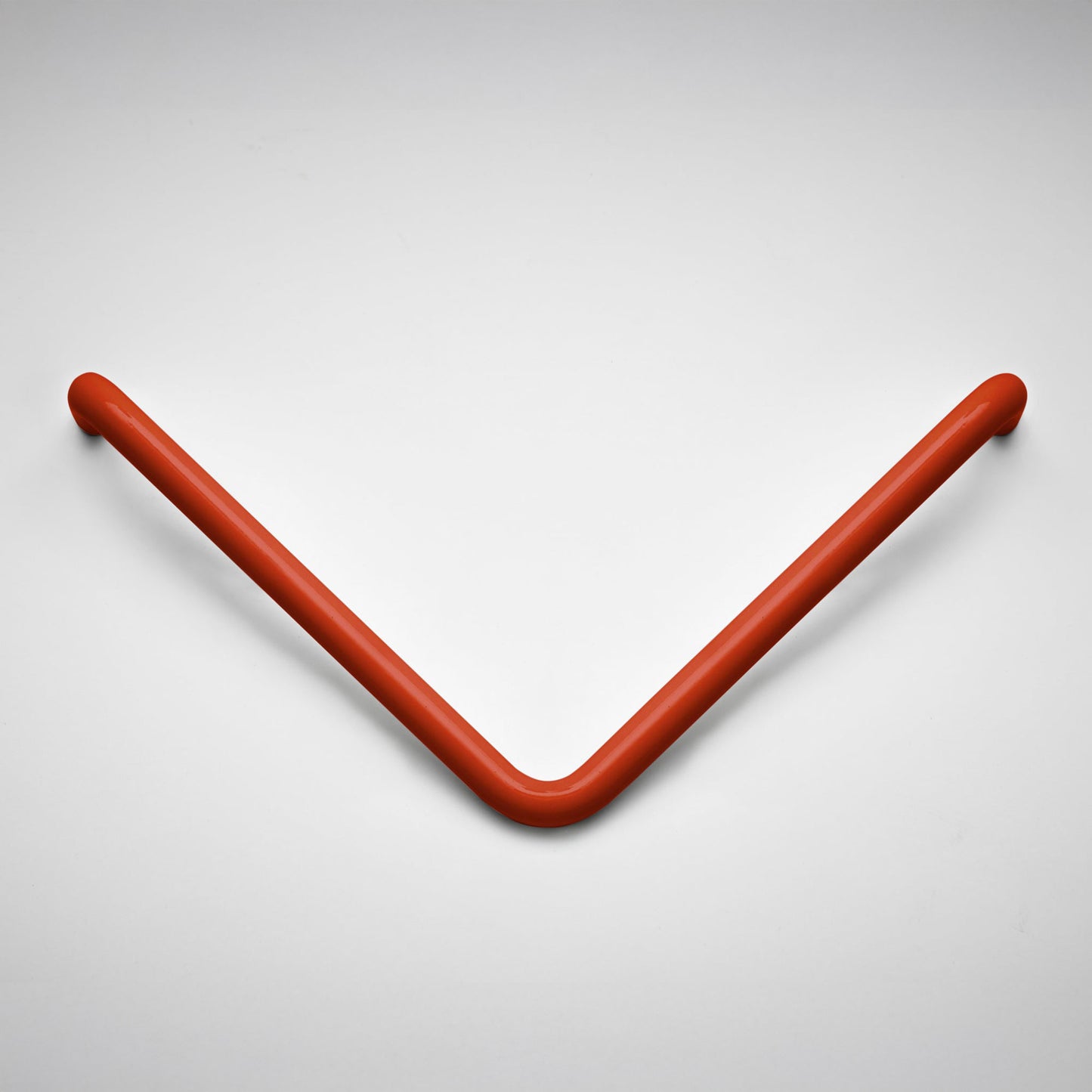A modern V-shaped cabinet pull in a matte reddish-brown finish, displayed on a clean light gray background.