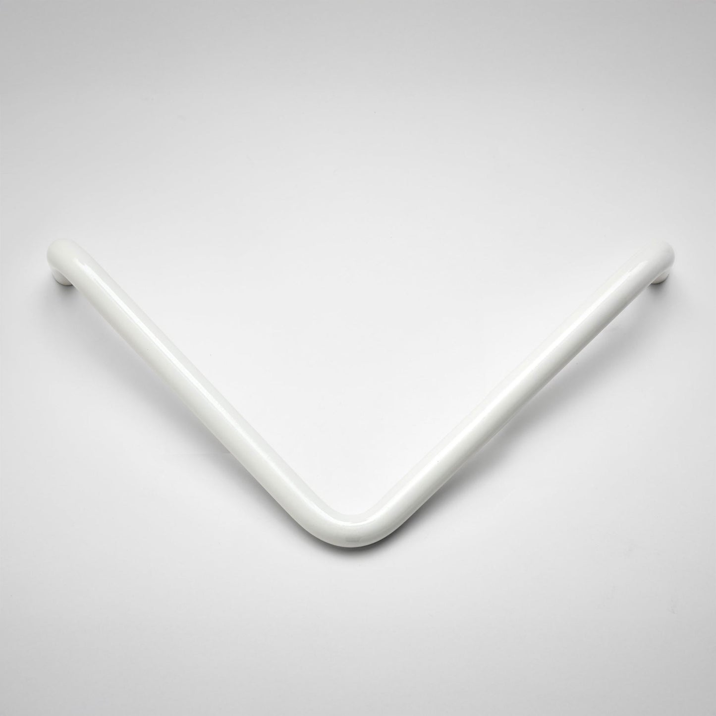 A white, curved metal cabinet pull with a smooth, rounded finish, shown on a clean light gray background.