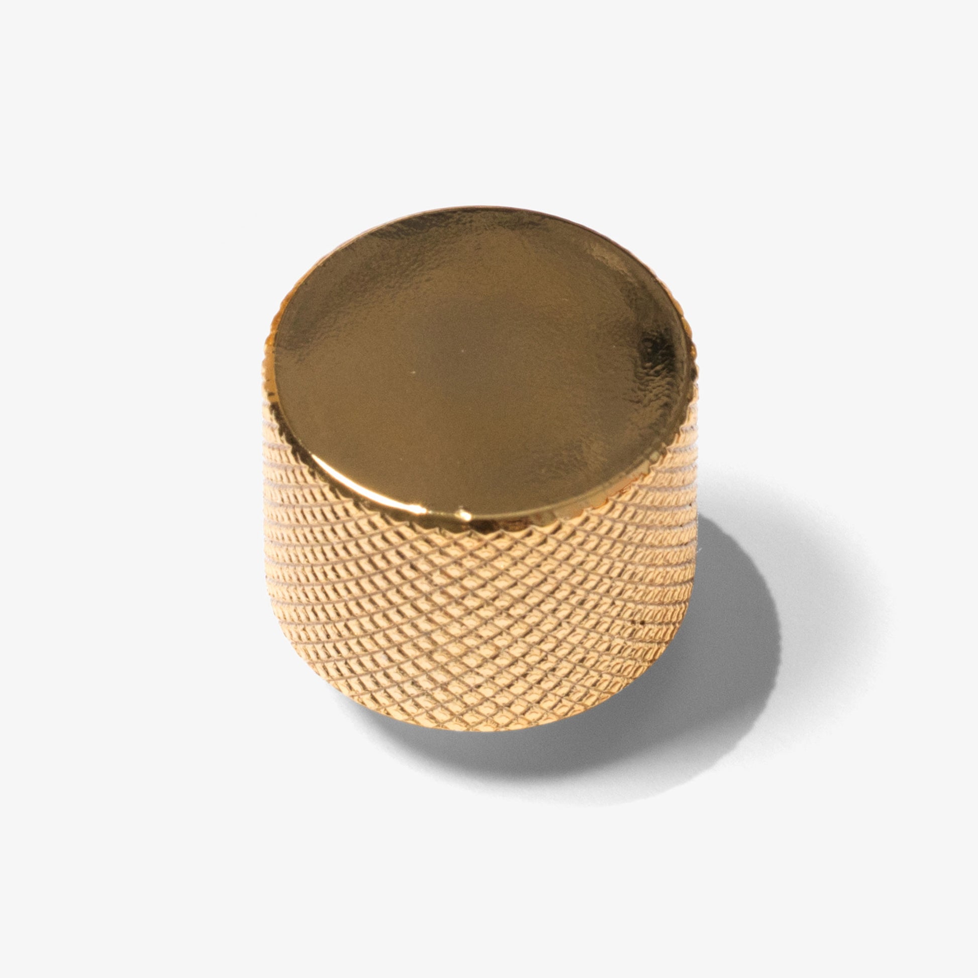 Polished gold knurled cabinet knob by Studio Marchant